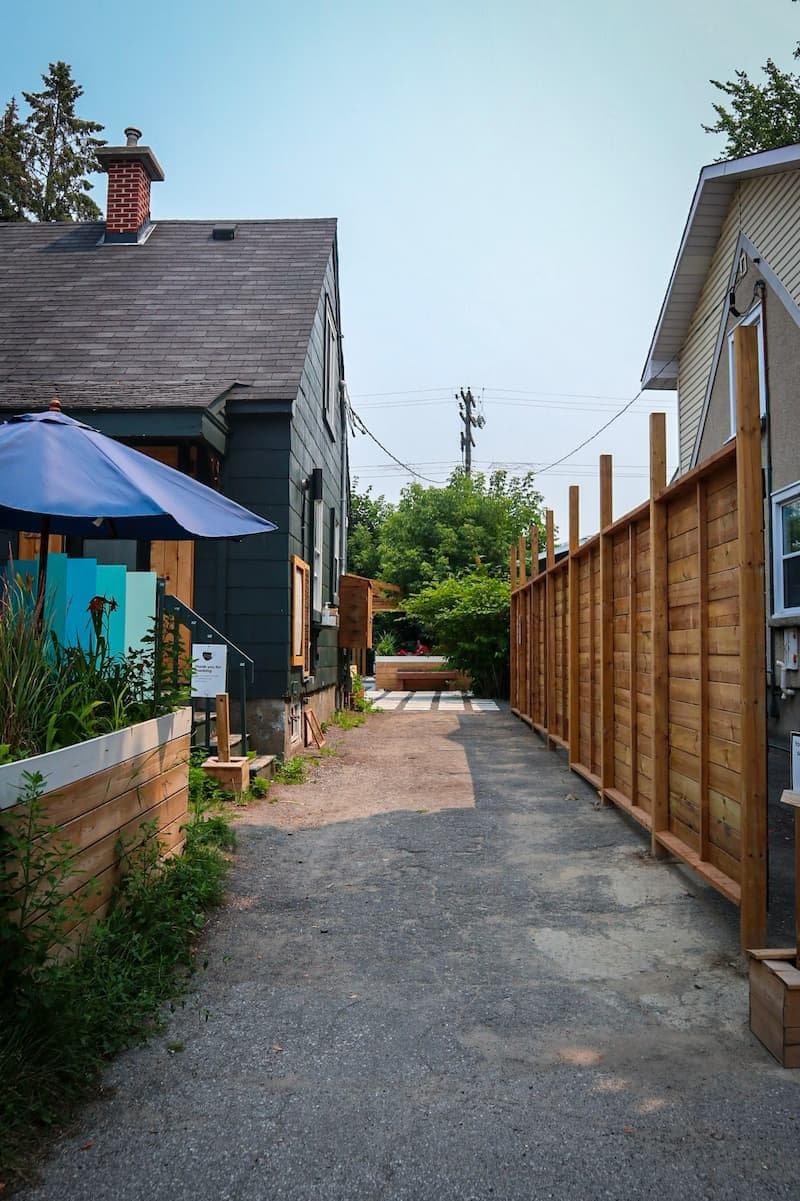 A view of Carlington Coffee House's take-out window and queuing area.